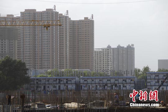 中国调低非限购市首套房首付比例释放稳楼市信号